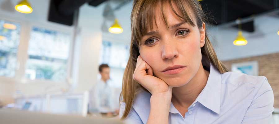 Female business tired desk computer